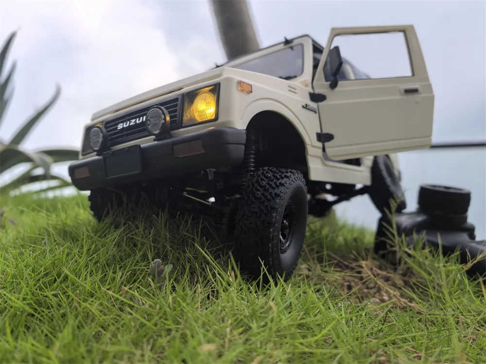 WPL C74-1 1/10 2.4G 4WD RTR Rc Car For SUZUKI JIMNY JA11 Truck Crawler Vehicle Models Toy Proportional Control WPL C74-1 1/10 2.4G 4WD RTR Rc Car For SUZUKI JIMNY JA11 Truck Crawler Vehicle Models Toy Proportional Control