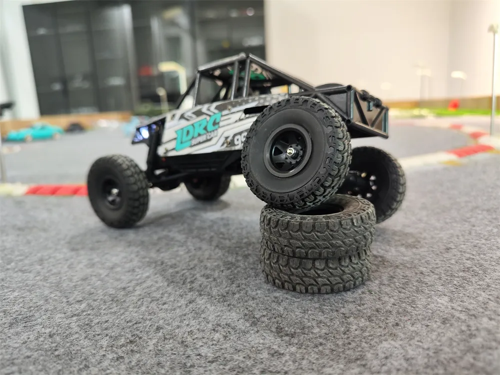 LDRC 18499 Waterproof Driving Version RTR 1/18 2.4G 4WD RC Car Rock Crawler Pipe Rack Off-Road Climbing Truck LED Light Full Proportional Vehicles Models Straight Bridge Axle Toys LDRC 18499 Waterproof Driving Version RTR 1/18 2.4G 4WD RC Car Rock Crawler Pipe Rack Off-Road Climbing Truck LED Light Full Proportional Vehicles Models Straight Bridge Axle Toys