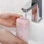 Portable Cordless Water Flosser with 4 Modes & 4 Nozzles Rechargeable IPX7 Waterproof 200ml Telescopic Water Tank Travel Oral Irrigator