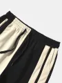 ChArmkpR Mens Smile Face Print Contrast Patchwork Loose Cuffed Sweatpants